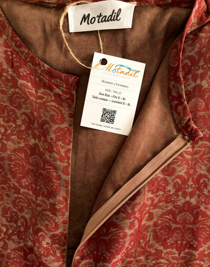 Inside of the maroon floral dress showing the MO'TADIL label and size tag